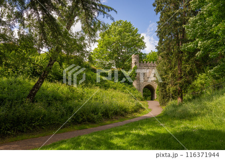Castle Grounds, a public park in Reigate, Surrey, UK. While the castle no longer exists, a mock medieval gateway was built over the ruins in 1777. Castle Grounds, a public park in Reigate, Surrey, UK. While the castle no longer exists, a mock medieval gateway was built over the ruins in 1777. 116371944