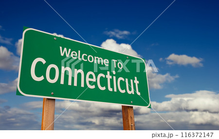 Welcome To Connecticut Green Road Sign Over Blue Sky with Some Clouds. Welcome To Connecticut Green Road Sign Over Blue Sky with Some Clouds. 116372147
