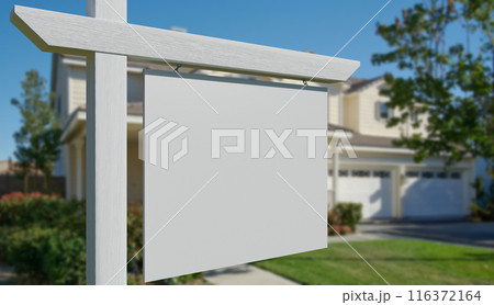 Blank Real Estate Sign in Front of Beautiful House. 116372164