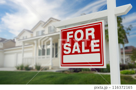 For Sale Real Estate Sign in Front of Beautiful House. 116372165