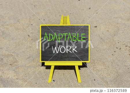 Adaptable work symbol. Concept words Adaptable work on beautiful yellow blackboard. Beautiful sand beach background. Business Adaptable work concept. Copy space. 116372589