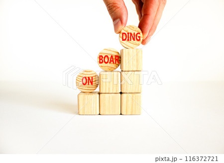 Onboarding success symbol. Concept word Onboarding on wooden circles. Businessman hand. Beautiful white background. Business onboarding success concept. Copy space. 116372721