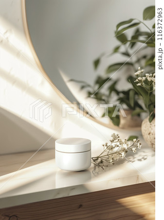 Minimalist bathroom counter with natural light and elegant skincare jar mockup on wooden table 116372963