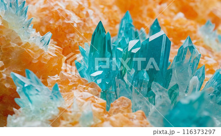 Cluster of emerald and orange crystals, abstract close-up background 116373297