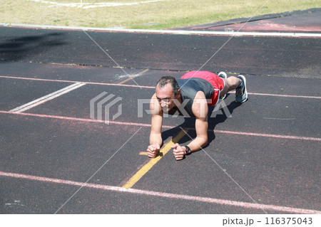 Different Shapes Of Plank For A Professional Athlete Different Shapes Of Plank For A Professional Athlete 116375043