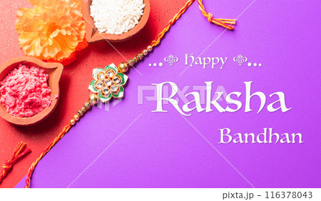 Raksha Bandhan, Indian festival with beautiful Rakhi and Rice Grains.  A traditional Indian wrist band which is a symbol of love between Sisters and Brothers. 116378043