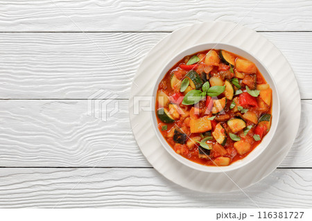 hearty italian vegetable stew in bowl, top view hearty italian vegetable stew in bowl, top view 116381727