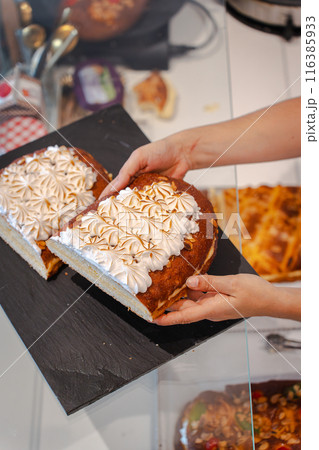 Cream-filled coke in a pastry shop. Vertical 116385933