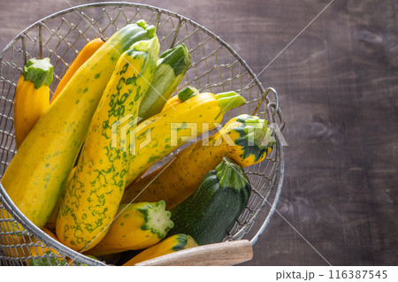 Yellow-green zucchini. Vegetables harvest. 116387545