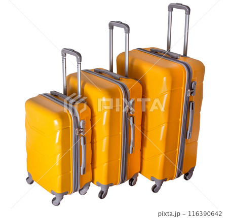 A set of yellow suitcases on wheels. Baggage. Travel suitcase isolated on white background A set of yellow suitcases on wheels. Baggage. Travel suitcase isolated on white background 116390642