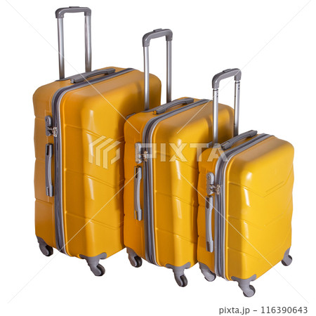 A set of yellow suitcases on wheels. Baggage. Travel suitcase isolated on white background A set of yellow suitcases on wheels. Baggage. Travel suitcase isolated on white background 116390643
