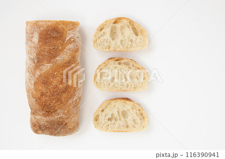 crusty baguette isolated on white background, top view crusty baguette isolated on white background, top view 116390941