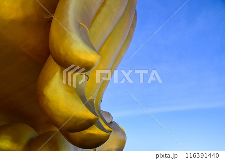 The finger of the world's largest sitting Buddha statue at Wat Muang, Ang Thong Province, Thailand. The finger of the world's largest sitting Buddha statue at Wat Muang, Ang Thong Province, Thailand. 116391440