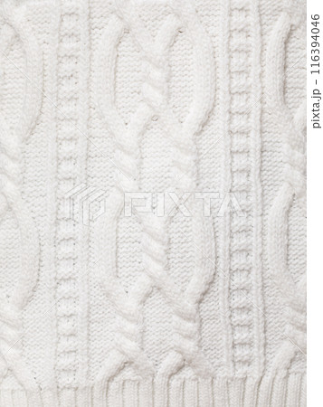 White cable knitting fabric textured background 116394046