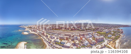 Drone panorama over the Italian city of Civitavecchia with harbor and cruise ships during the day 116394108