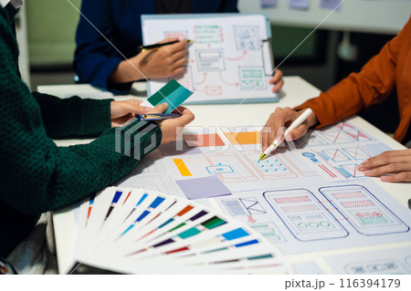 Creative team web designer feel happy work complete Teamwork planning application, success at work in the office concept. 116394179