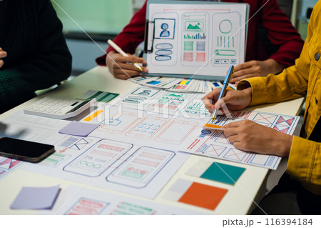 Creative team web designer feel happy work complete Teamwork planning application, success at work in the office concept. 116394184