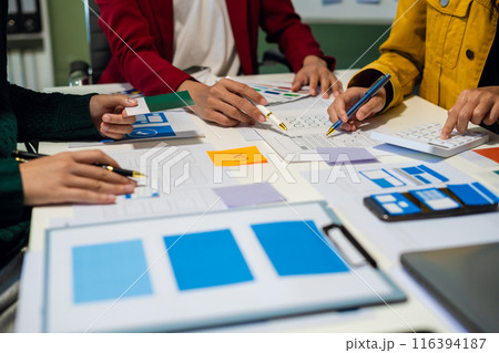 Creative team web designer feel happy work complete Teamwork planning application, success at work in the office concept. 116394187