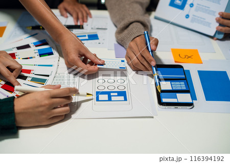 Creative team web designer feel happy work complete Teamwork planning application, success at work in the office concept. 116394192