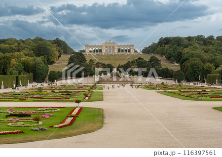 Vienna, Austria, August 20, 2022. In the gardens of Schonbrunn Palace, the historic greenhouse stands out for its characteristic design. Travel destinations. Copy space 116397561