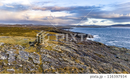 Aerial view a stone pillar at the beautiful coastline at Dawros in County Donegal - Ireland 116397934