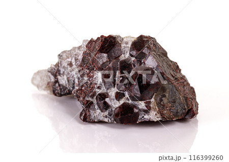 Macro stone garnet mineral on white background Macro stone garnet mineral on white background 116399260