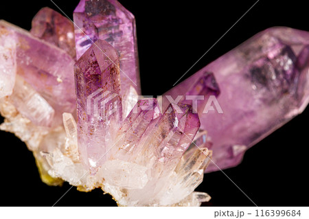 Macro of amethyst mineral stone on black background 116399684