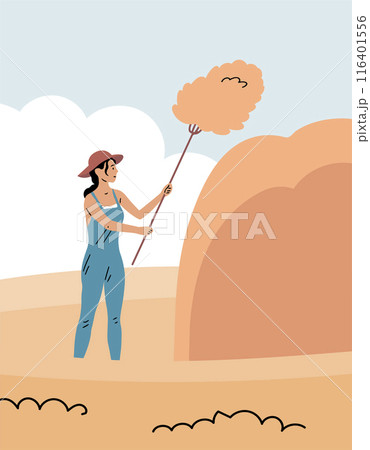 Village farmer woman collecting hay in a stack 116401556