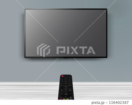 Watching online TV with remote control. Remote control is pointed at the modern flat screen TV on the wall. 116402387