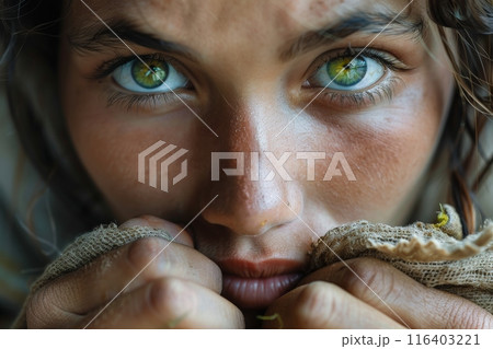 Intense Green Eyes Close-Up Portrait 116403221