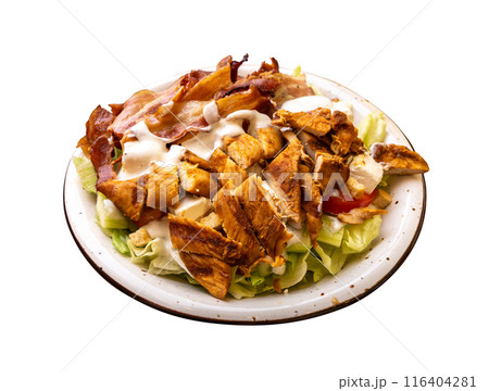 Polish Caesar salad with chicken, bacon and vegetables, high-calorie meat salad with fresh vegetables 116404281
