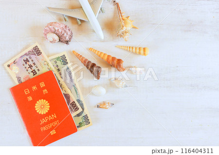 Flight travelling an Japanese yen cash bills Japan passport in airplane Flight travelling an Japanese yen cash bills Japan passport in airplane 116404311