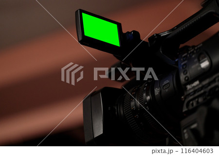 Close-up of Camera with Green Screen 116404603