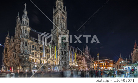 Marienplazt Old Town Square with Town Hall Clock Tower Glockenspiel night timelapse hyperlapse. 116405071