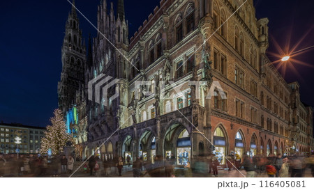 Main facade of the New Town Hall building at the northern part of Marienplatz day to night timelapse in Munich, Germany. 116405081