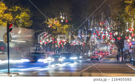 Avenida da Liberdade in Lisbon illuminated with lights hanging from the trees night timelapse. Portugal 116405093