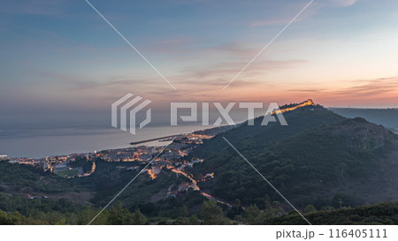 Panorama showing aerial view of Sesimbra Town and Port day to night timelapse, Portugal. Panorama showing aerial view of Sesimbra Town and Port day to night timelapse, Portugal. 116405111