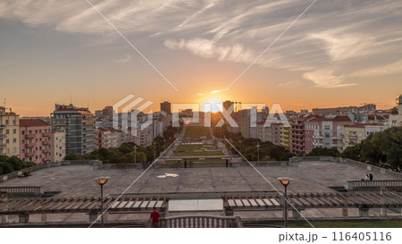 Panorama showing sunset over lawn at Alameda Dom Afonso Henriques and the Luminous Fountain aerial timelapse in Lisbon. Panorama showing sunset over lawn at Alameda Dom Afonso Henriques and the Luminous Fountain aerial timelapse in Lisbon. 116405116
