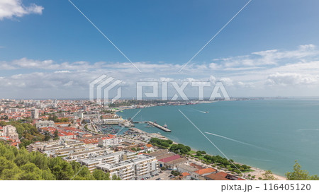 Panorama showing aerial view of marina and city center timelapse in Setubal, Portugal. Panorama showing aerial view of marina and city center timelapse in Setubal, Portugal. 116405120