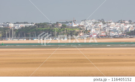 Boats and yachts in harbor on the beach timelapse in Portimao, Portugal Boats and yachts in harbor on the beach timelapse in Portimao, Portugal 116405152