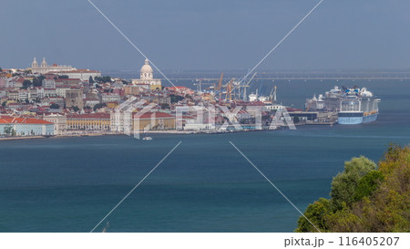 Aerial view of Lisbon over Tagus river from viewpoint of Cristo Rei in Almada with yachts tourist boats timelapse. Lisbon, Portugal 116405207