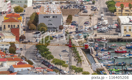 Aerial view of marina and city center timelapse in Setubal, Portugal. Aerial view of marina and city center timelapse in Setubal, Portugal. 116405208