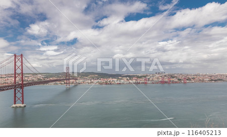 Panorama showing Lisbon cityscape and Tagus river timelapse with 25 of April bridge Panorama showing Lisbon cityscape and Tagus river timelapse with 25 of April bridge 116405213