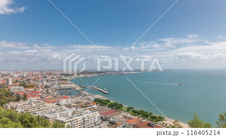 Panorama showing aerial view of marina and city center timelapse in Setubal, Portugal. Panorama showing aerial view of marina and city center timelapse in Setubal, Portugal. 116405214