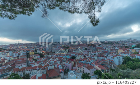 Panorama showing aerial cityscape day to night transition from Miradouro da Graca viewing point in Lisbon city after sunset Panorama showing aerial cityscape day to night transition from Miradouro da Graca viewing point in Lisbon city after sunset 116405227