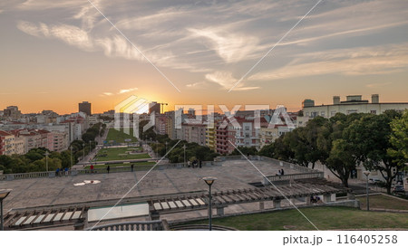 Panorama showing sunset over lawn at Alameda Dom Afonso Henriques and the Luminous Fountain aerial timelapse in Lisbon. Panorama showing sunset over lawn at Alameda Dom Afonso Henriques and the Luminous Fountain aerial timelapse in Lisbon. 116405258