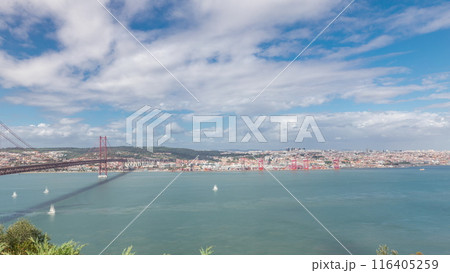Panorama showing Lisbon cityscape and Tagus river timelapse with 25 of April bridge Panorama showing Lisbon cityscape and Tagus river timelapse with 25 of April bridge 116405259