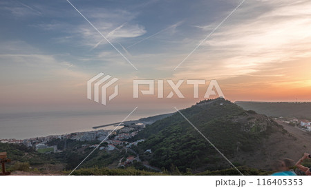 Panorama showing aerial View of Sesimbra Town and Port during sunset timelapse, Portugal. Panorama showing aerial View of Sesimbra Town and Port during sunset timelapse, Portugal. 116405353