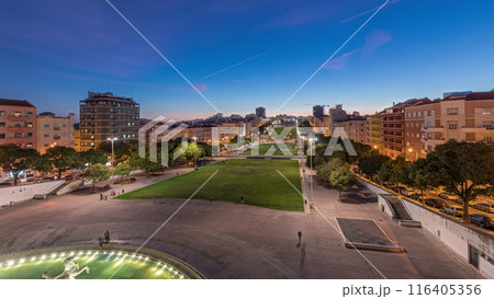 Panorama showing lawn at Alameda Dom Afonso Henriques and the Luminous Fountain aerial day to night timelapse in Lisbon. Panorama showing lawn at Alameda Dom Afonso Henriques and the Luminous Fountain aerial day to night timelapse in Lisbon. 116405356