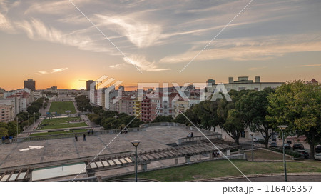 Panorama showing sunset over lawn at Alameda Dom Afonso Henriques and the Luminous Fountain aerial timelapse in Lisbon. Panorama showing sunset over lawn at Alameda Dom Afonso Henriques and the Luminous Fountain aerial timelapse in Lisbon. 116405357
